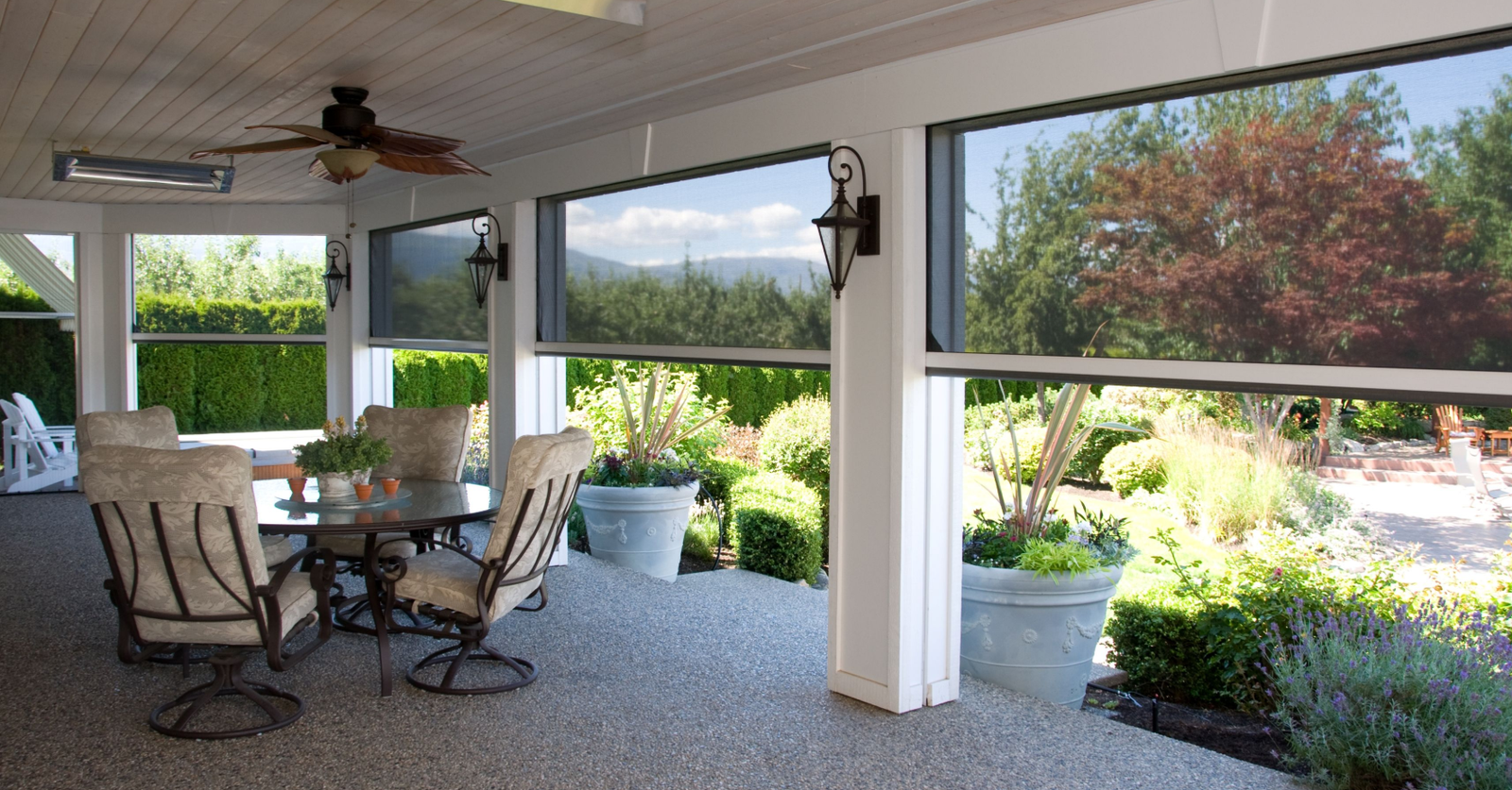 Close-up view from inside a green patio umbrella showcasing the structural framework.
